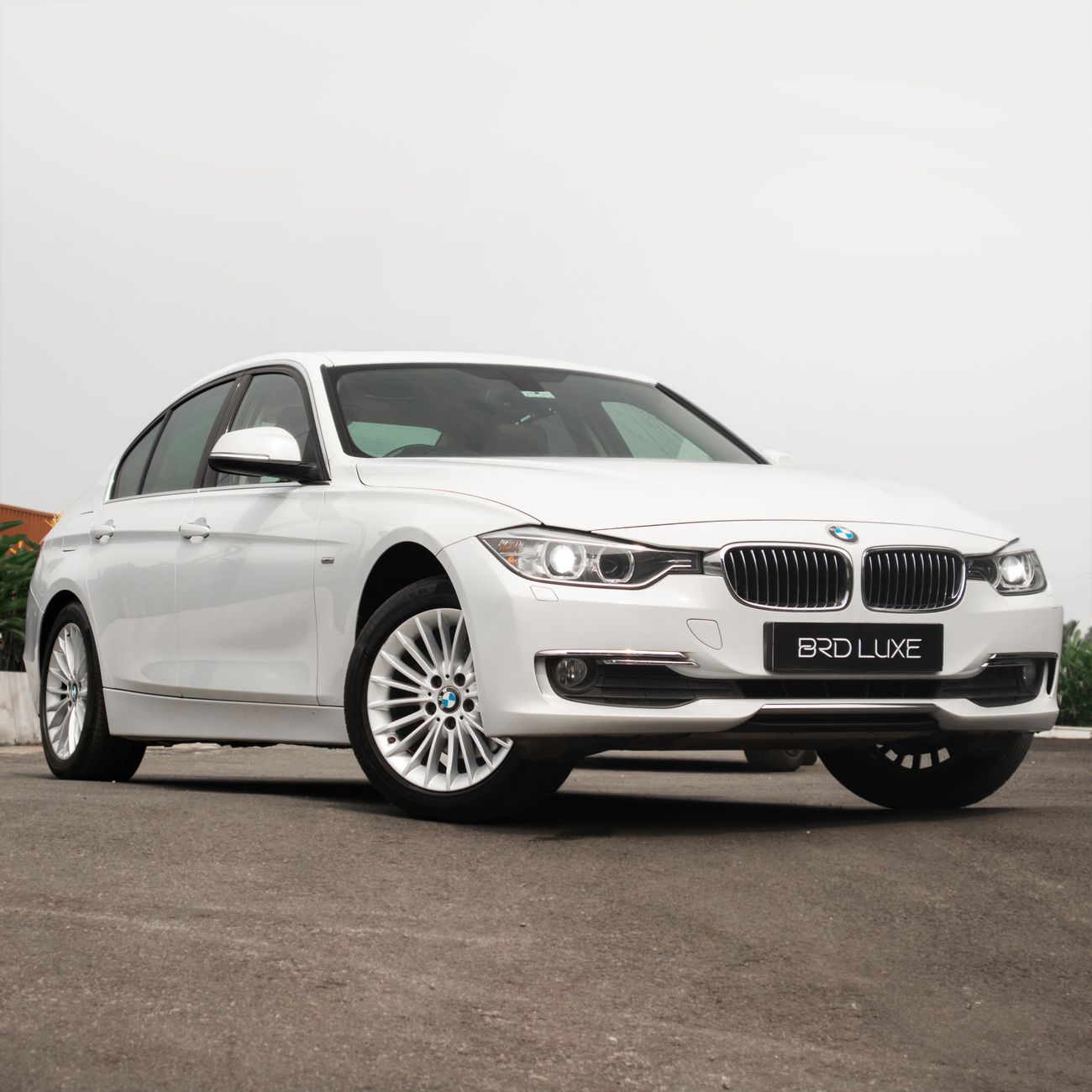 close up of a white luxury sedan